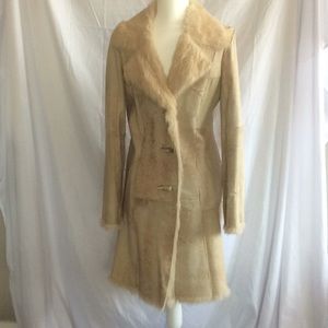 Leather coat with rabbit fur lining